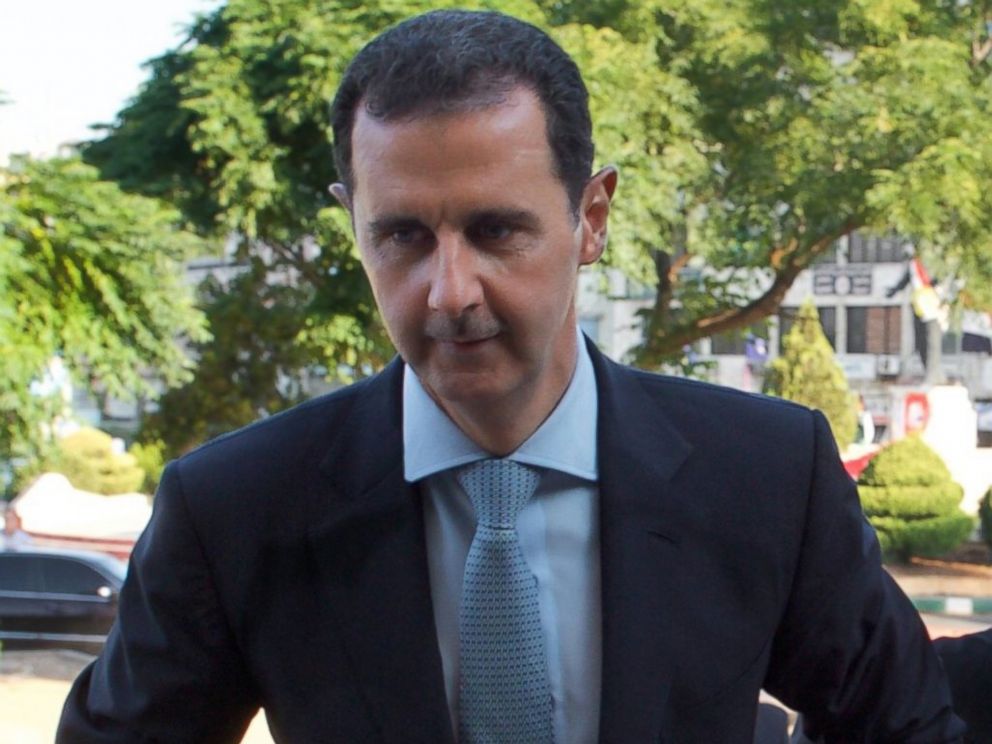 PHOTO: Bashar al-Assad arrives at the al-Safa Mosque, in the government-controlled Akrama neighbourhood of Syrias central city of Homs, for prayers marking Eid al-Fitr which celebrates the end of the Muslim holy fasting month of Ramadan, July 6, 2016.