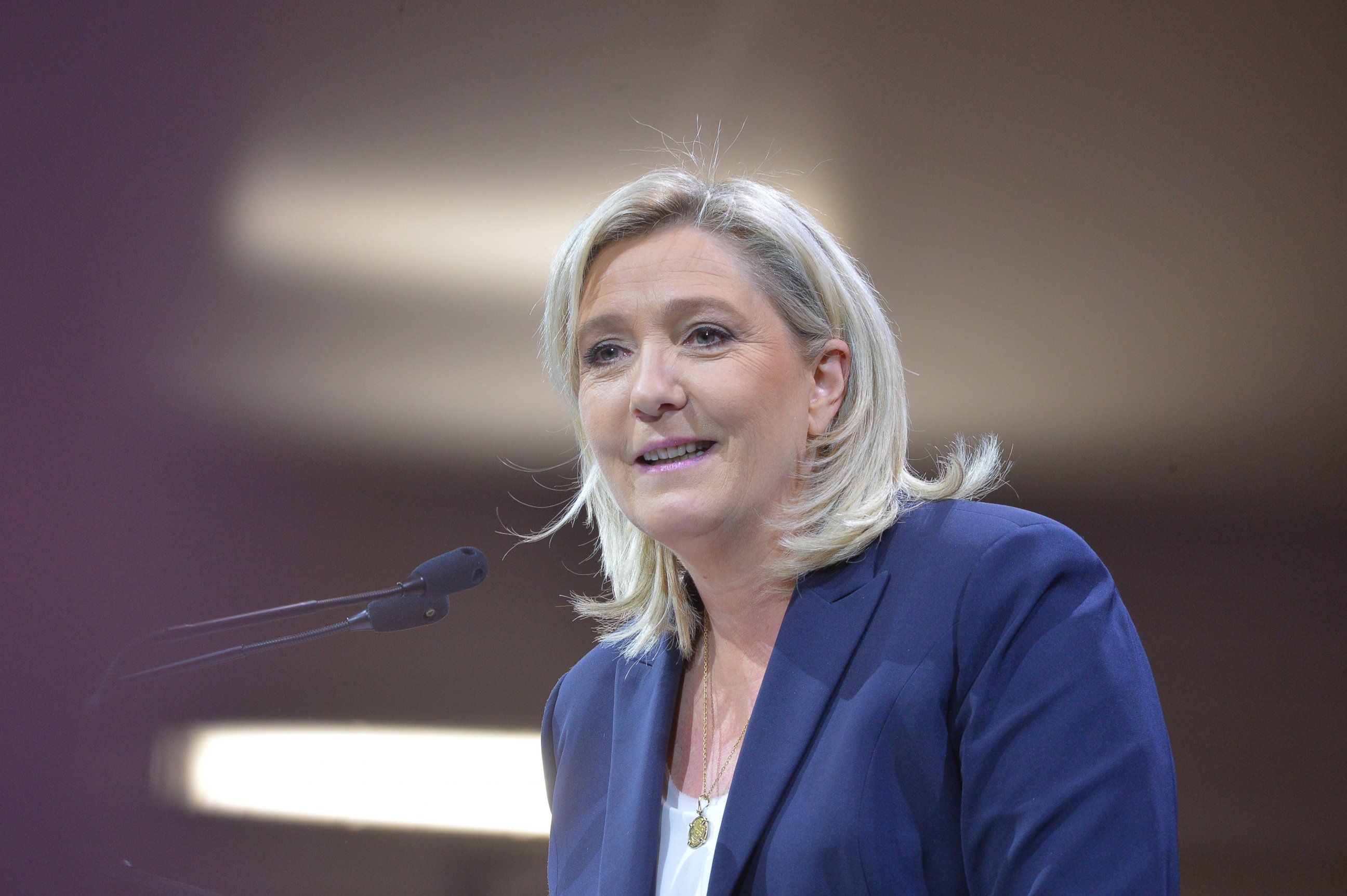 PHOTO: National Front (Front National - FN) Marine Le Pen delivers a speech during a May Day party lunch at the Paris Event Center in Porte de la Villette, May 1, 2016, in Paris. 
