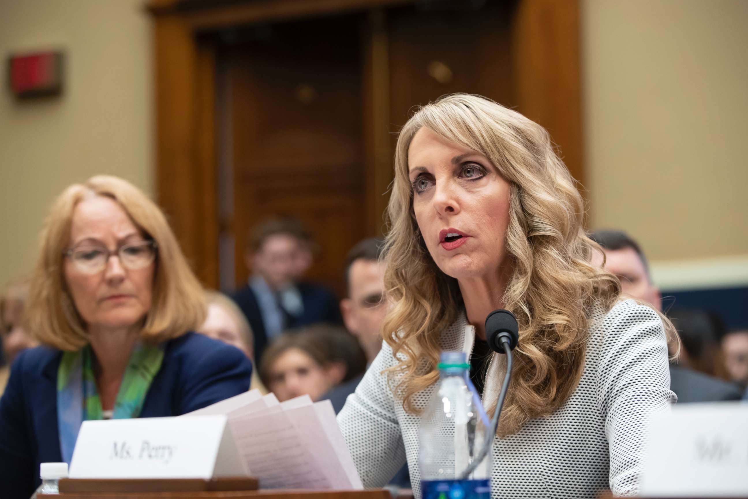 PHOTO: USA Gymnastics President and CEO Kerry Perry, center, joined at left by U.S. Olympic Committee Acting CEO Susanne Lyons, testifies before the House Commerce Oversight and Investigations Subcommittee in Washington, May 23, 2018.