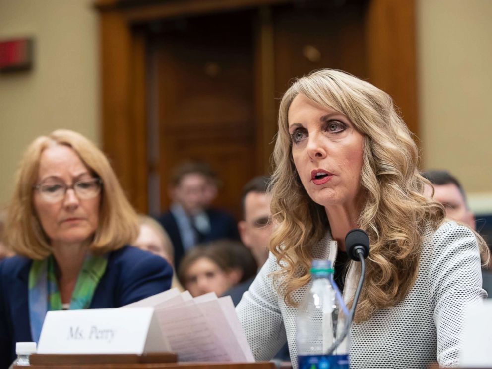PHOTO: USA Gymnastics President and CEO Kerry Perry, center, joined at left by U.S. Olympic Committee Acting CEO Susanne Lyons, testifies before the House Commerce Oversight and Investigations Subcommittee in Washington, May 23, 2018.