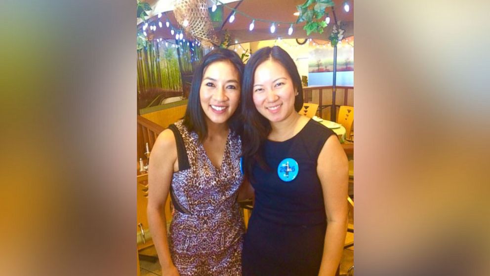 PHOTO: Angela Xin, 22, (right) with Olympic figure skater Michelle Kwan at a Democratic Party phone banking event in Nevada. 