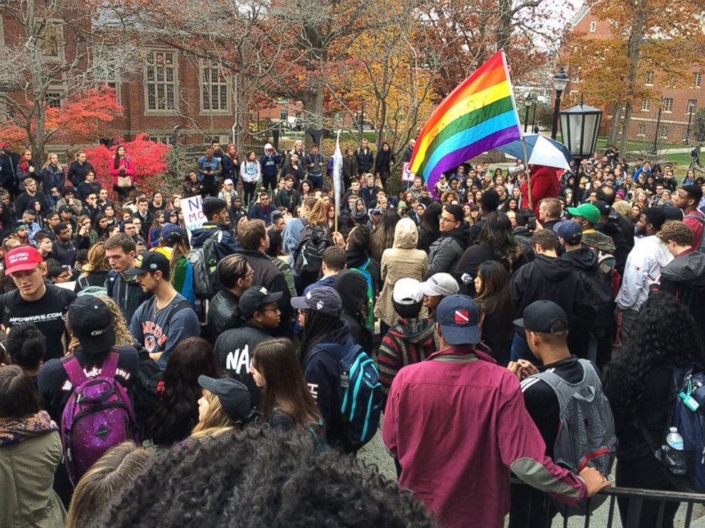 PHOTO: People protest on the University of Connecticut campus against the election of Republican Donald Trump as president, Nov. 9, 2016, in Storrs, Conn. The chief diversity officer reassures minority students the university has their backs.