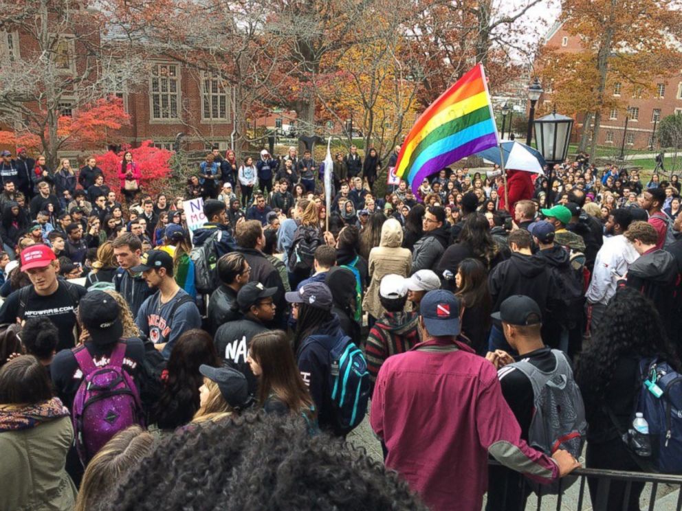 PHOTO: People protest on the University of Connecticut campus against the election of Republican Donald Trump as president, Nov. 9, 2016, in Storrs, Conn.  The chief diversity officer reassures minority students the university has their backs. 