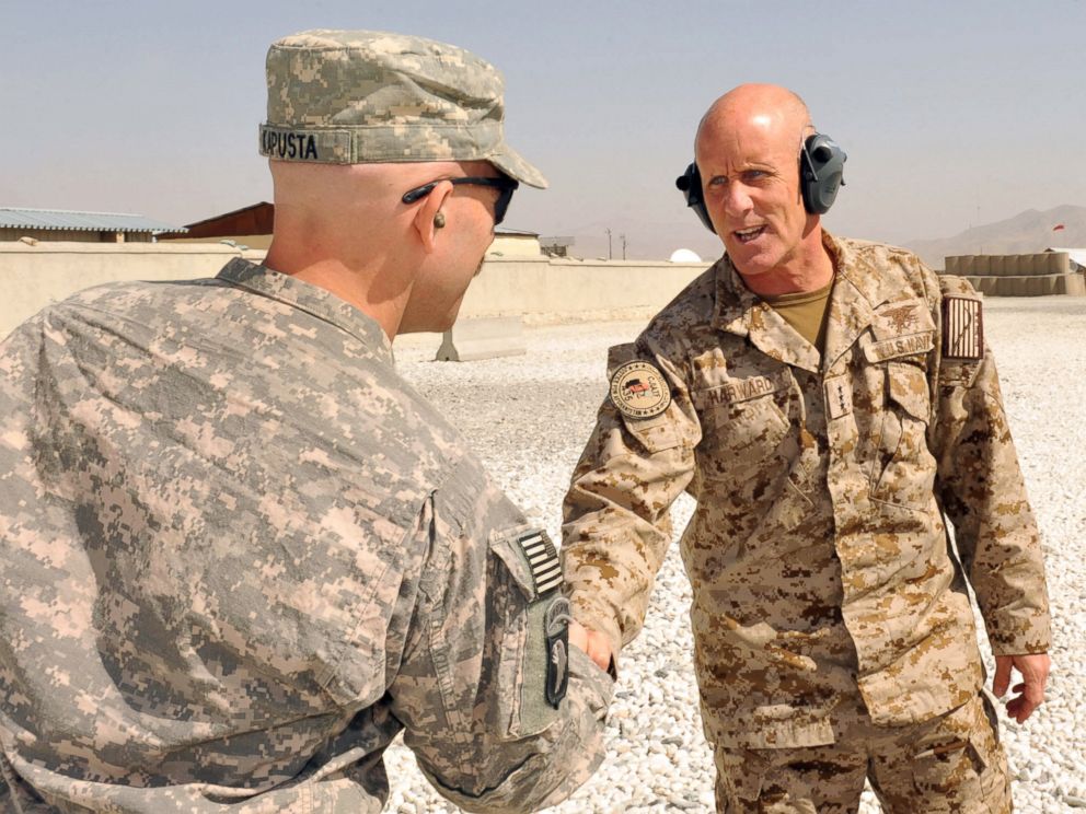 PHOTO: U.S. Navy Vice Adm. Robert Harward shakes hands with U.S. Navy Cmdr. Philip Kapusta, Ghazni at Forward Operating Base Ghazni Oct. 13.