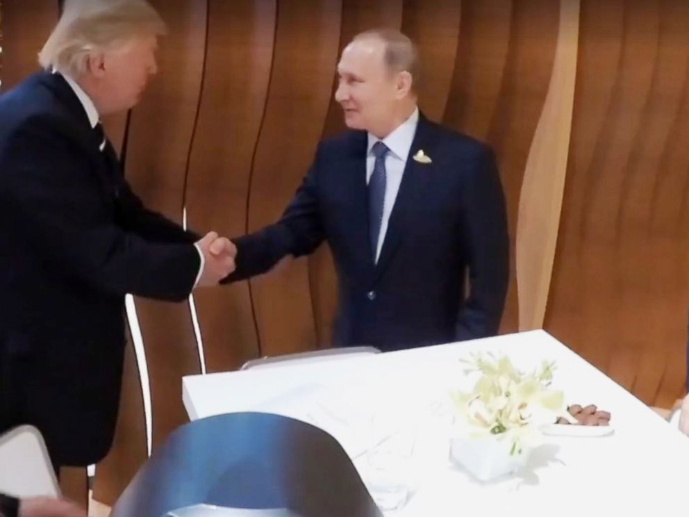 PHOTO: President Donald Trump and Russian President Vladimir Putin shake hands at the G-20 summit in Hamburg, Germany, July 7, 2017.