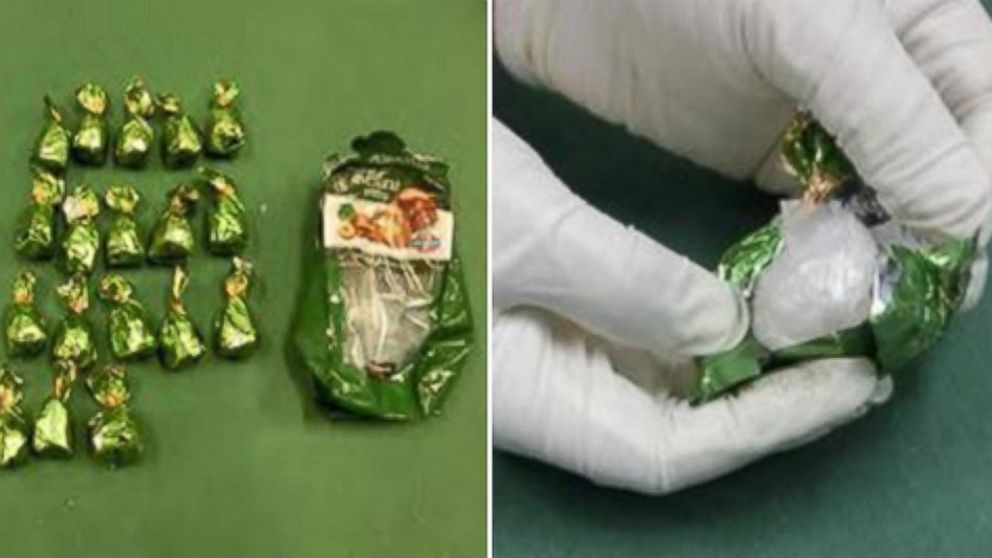 Handout image provided by ICE showing illegal drugs that were wrapped like candy.   