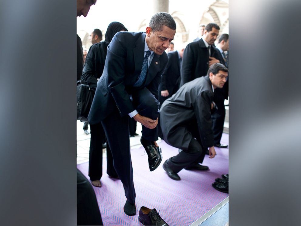 PHOTO: President Barack Obama removes his shoes as he prepares to visit the Blue Mosque April 7, 2009, in Istanbul, Turkey. 