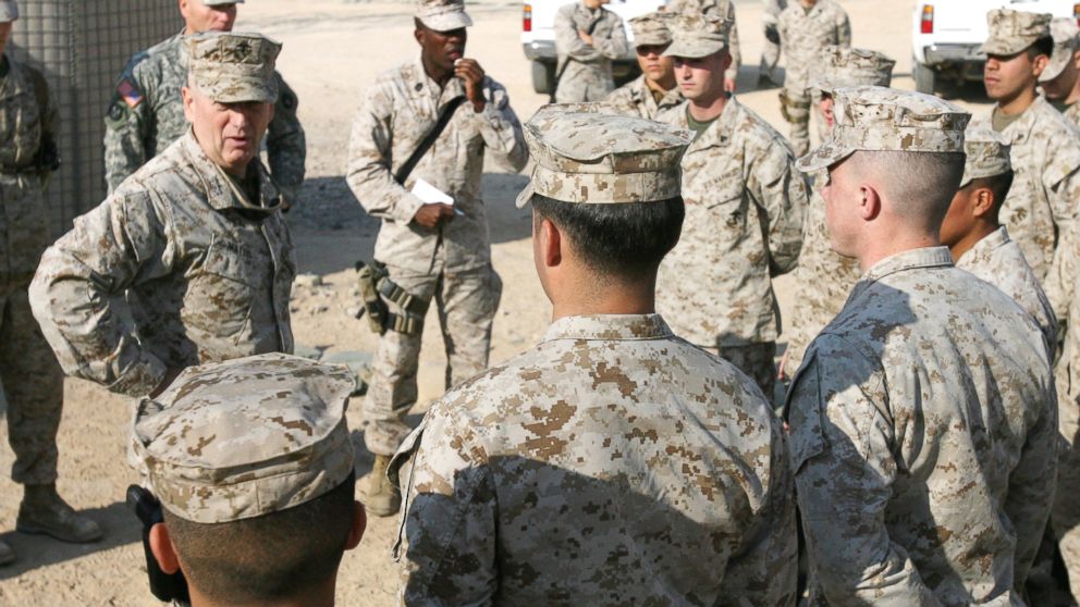 PHOTO: Lt. Gen. James M. Mattis, Commanding General, U.S. Marine Forces Central Command and 1st Marine Expeditionary Force, speaks with Marines during a visit to Camp Taqaddum, Iraq, Dec. 9, 2006. 