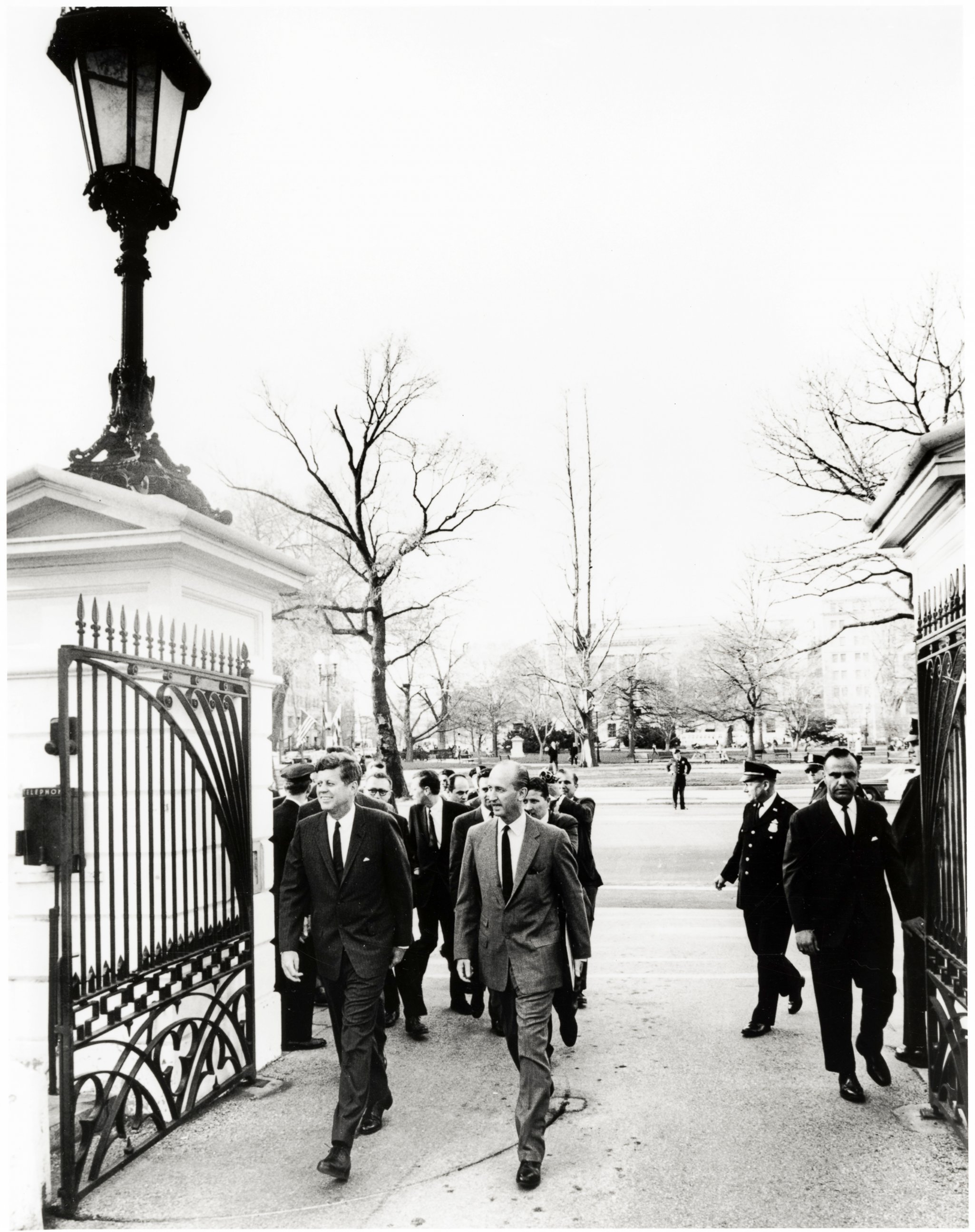 PHOTO: President Kennedy walks home from Blair House, March 28, 1963.