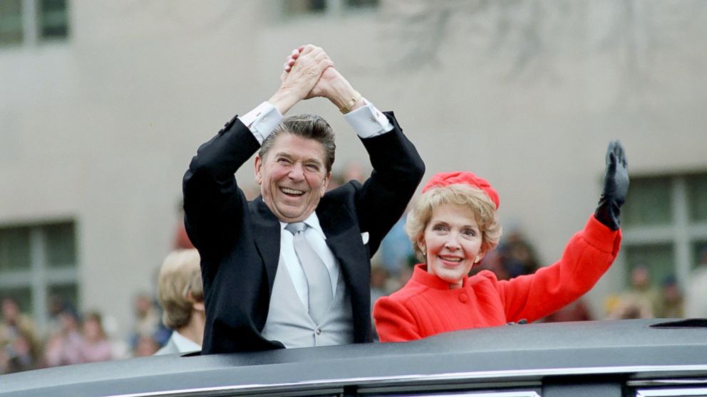 PHOTO: President Reagan and first lady Nancy Reagan wave from the limousine during the Inaugural Parade in Washington, Jan. 20, 1981.