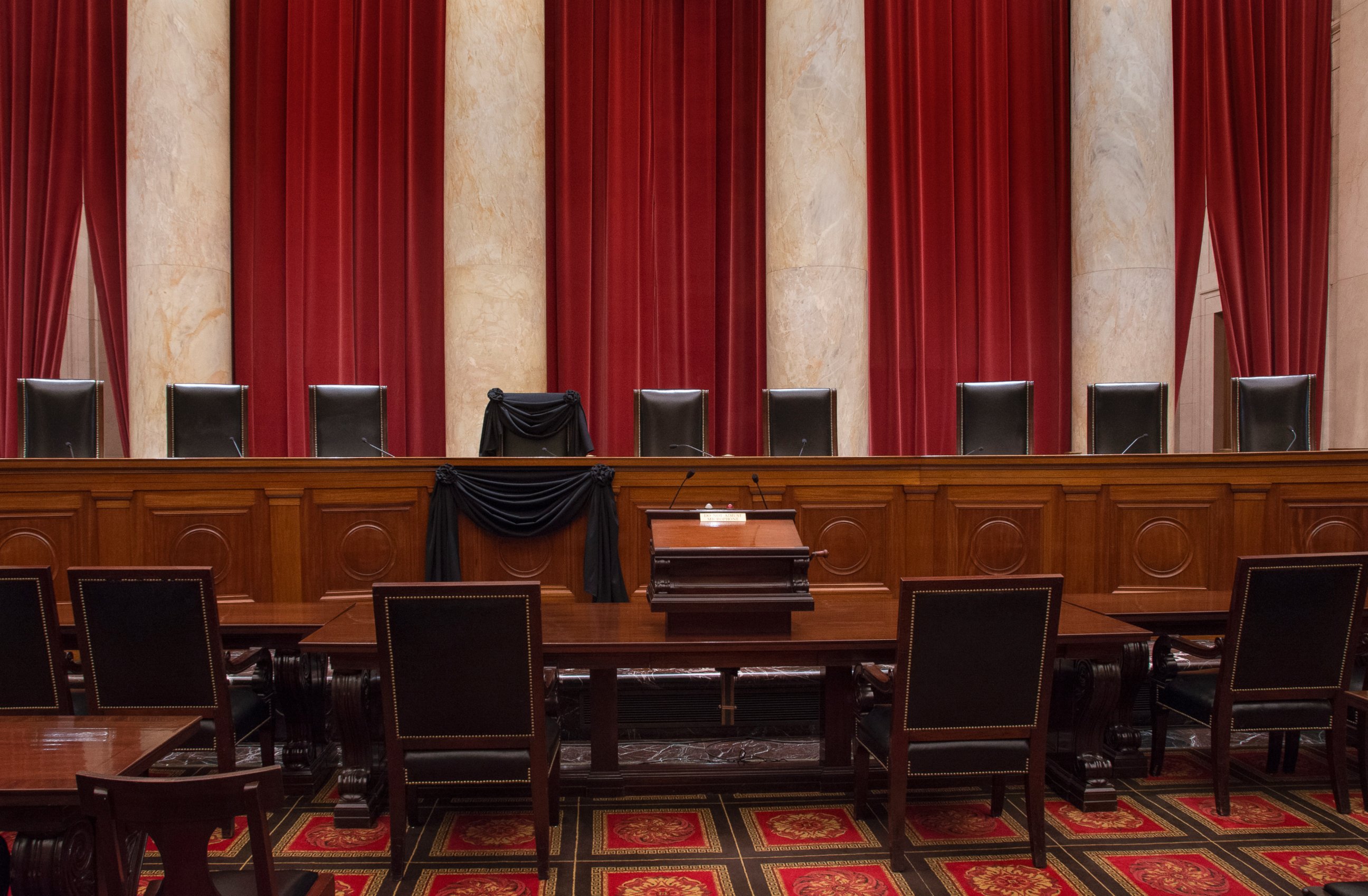 PHOTO: The courtroom of the Supreme Court showing Associate Justice Antonin Scalia's bench chair and the bench in front of his seat draped in black following his death on Feb. 13, 2016.  