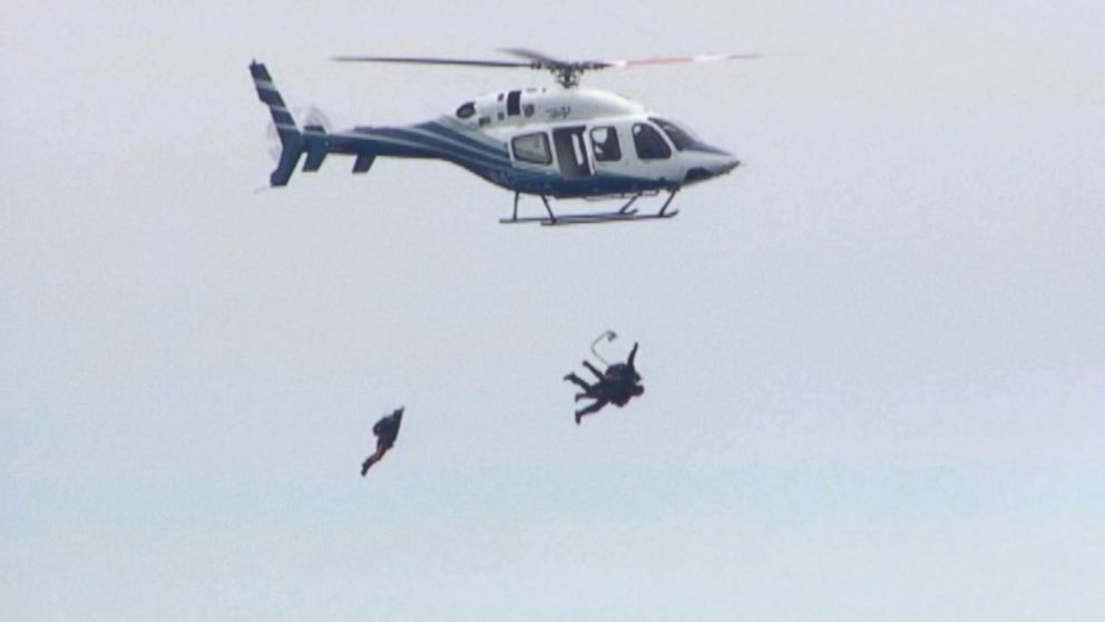 PHOTO: George H. W. Bush made his eighth parachute jump to mark his 90th birthday, June 12, 2014.