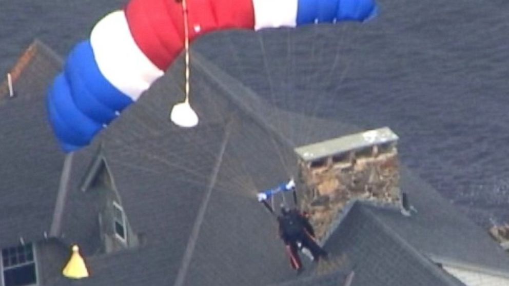 PHOTO: George H. W. Bush made his eighth parachute jump to mark his 90th birthday, June 12, 2014.