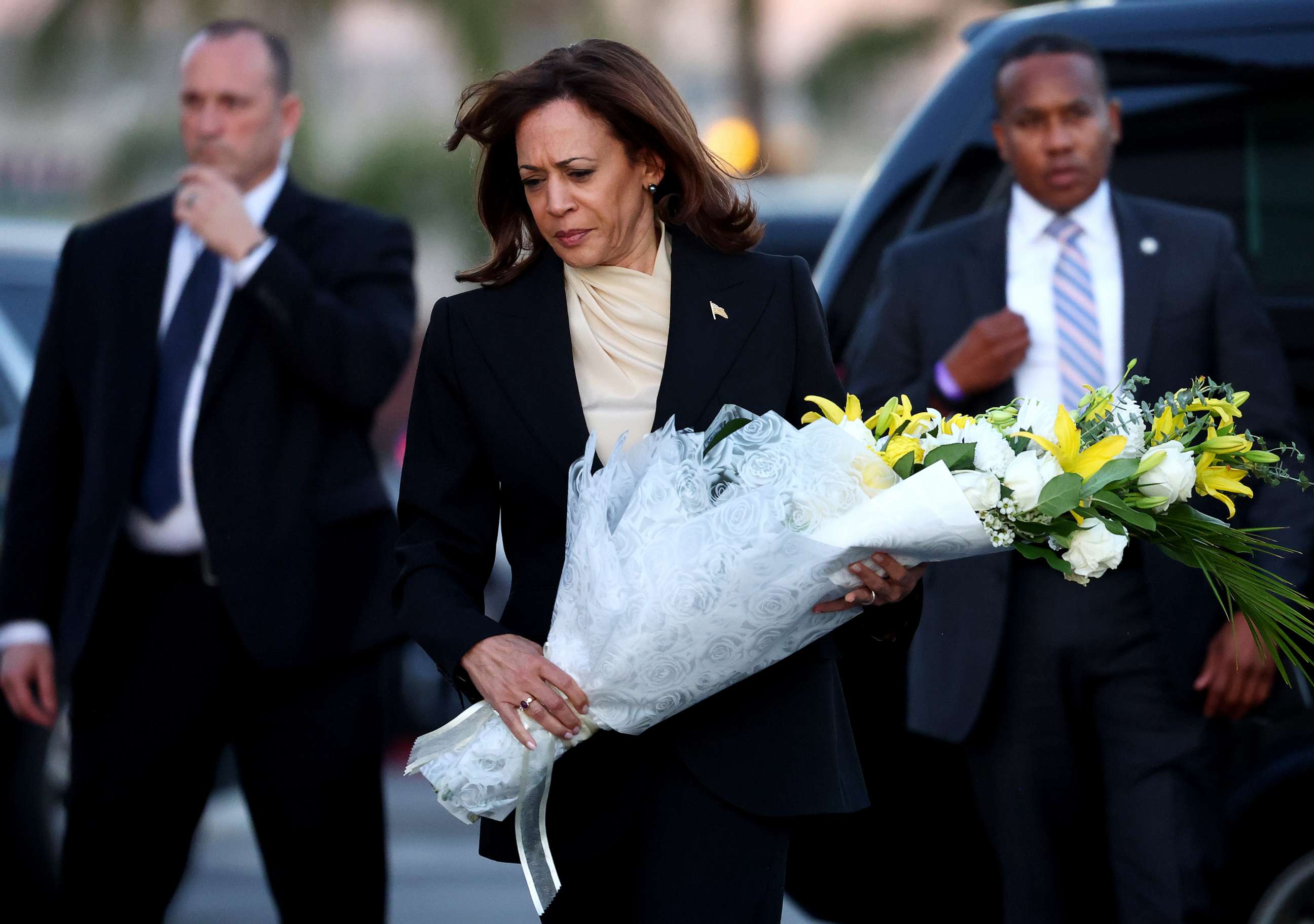 PHOTO: U.S. Vice President Kamala Harris walks to lay flowers at the memorial outside the Star Ballroom Dance Studio where a deadly mass shooting took place on January 25, 2023 in Monterey Park, California.