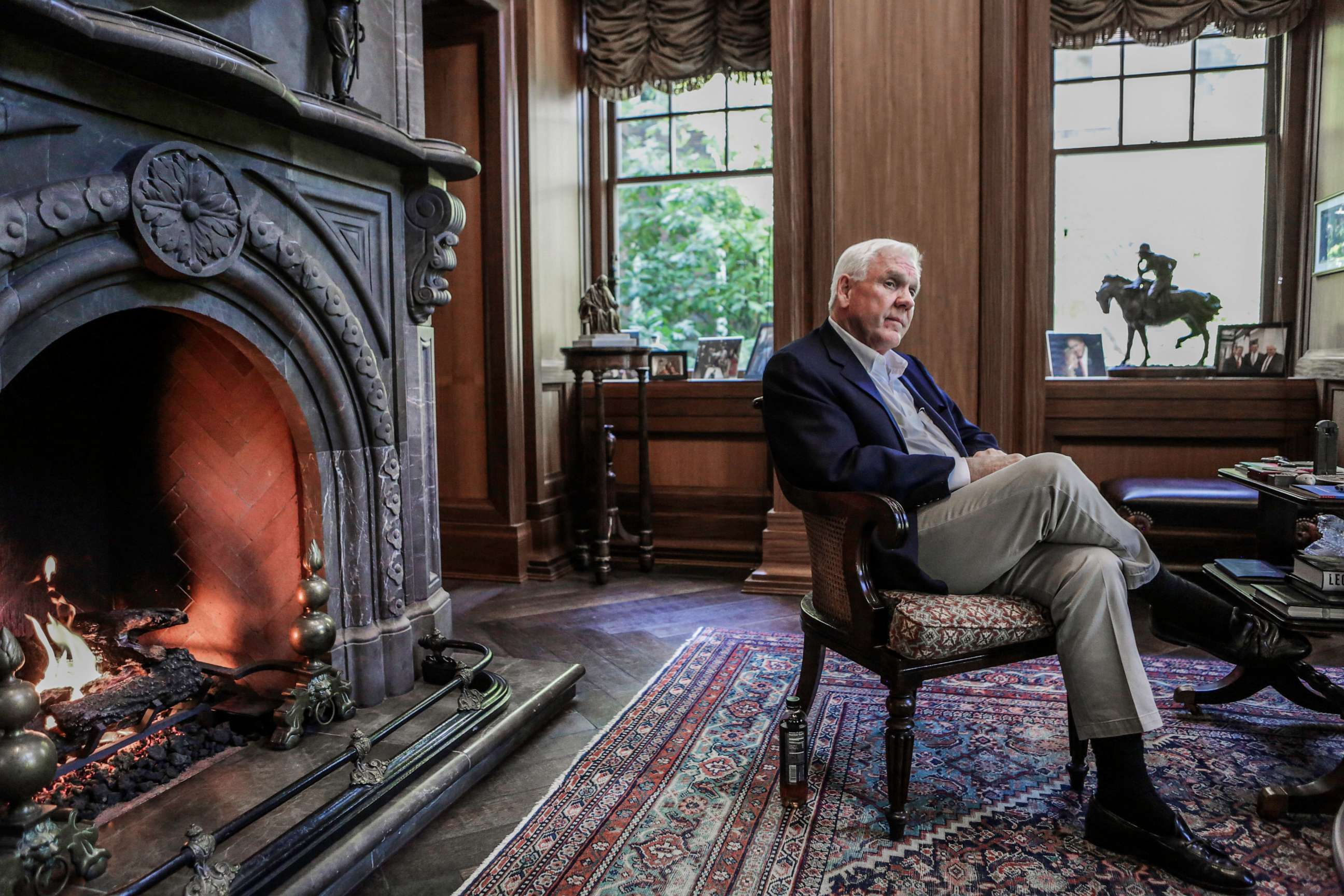 PHOTO: Harlan Crow, chairman and chief executive officer of Crow Holdings LLC, sits for a photograph at the Old Parkland estate offices in Dallas, Oct. 2, 2015.