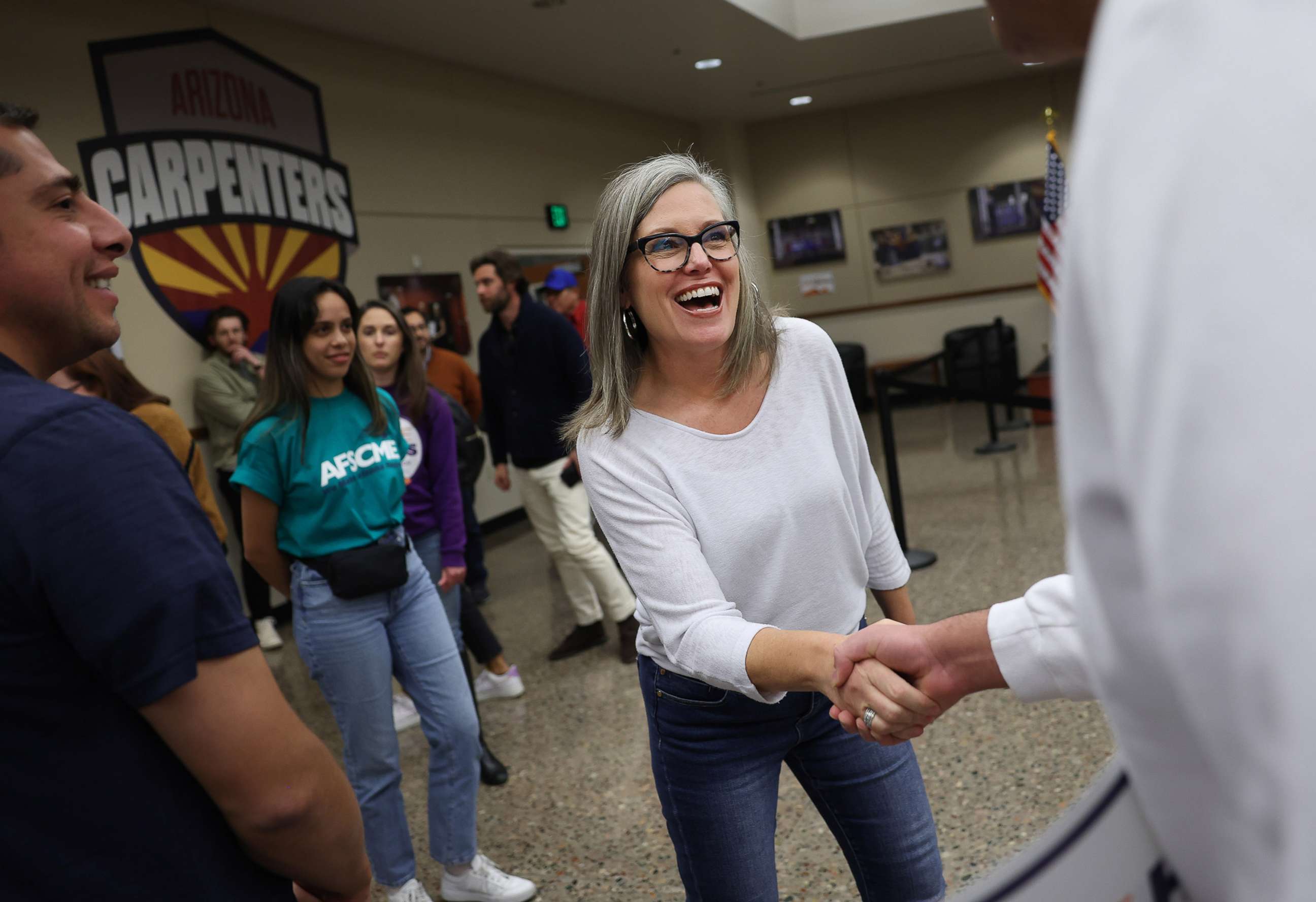 PHOTO: Arizona Democratic gubernatorial candidate Katie Hobbs greets supporters during a campaign event at the Carpenters Local Union 1912 headquarters, Nov. 5, 2022, in Phoenix.