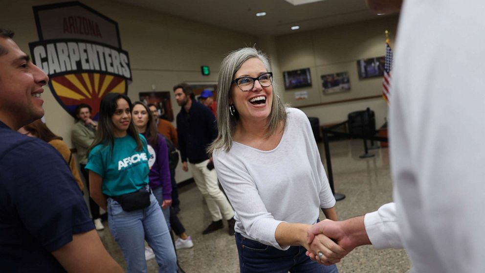 PHOTO: Arizona Democratic gubernatorial candidate Katie Hobbs greets supporters during a campaign event at the Carpenters Local Union 1912 headquarters, Nov. 5, 2022, in Phoenix.