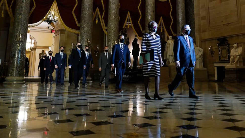 PHOTO:ClNine Democratic House impeachment managers at the Capitol, to deliver to the Senate the article of impeachment against former President Donald Trump, Jan. 25, 2021.
