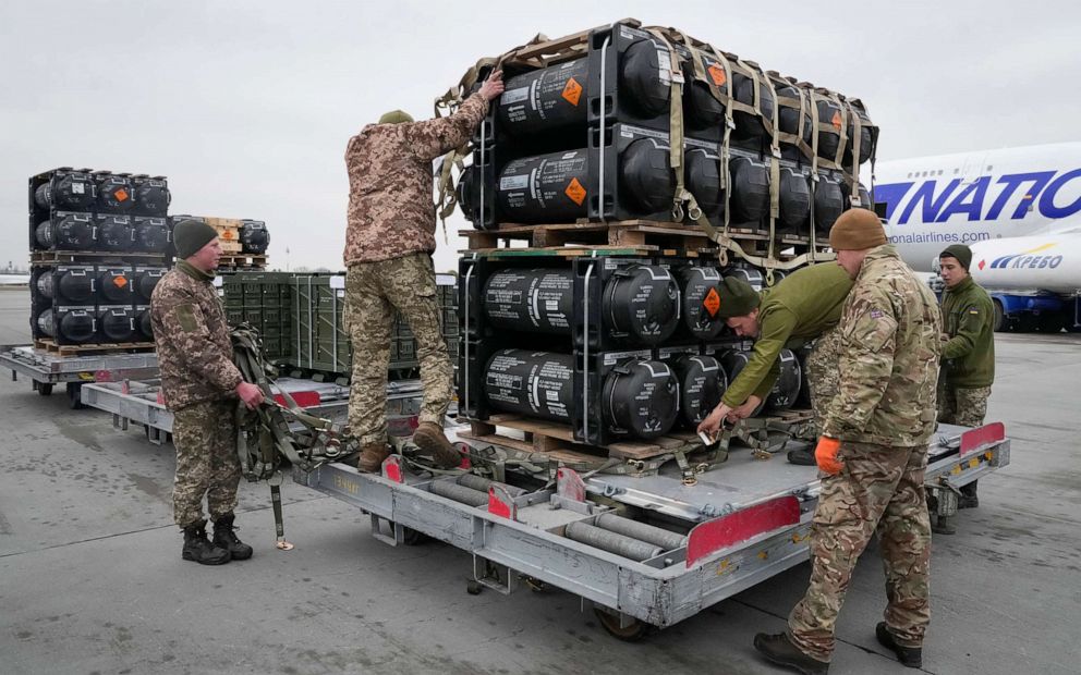 PHOTO: Ukrainian servicemen unpack Javelin anti-tank missiles, delivered as part of the United States of America's security assistance to Ukraine, at the Boryspil airport, outside Kyiv, Ukraine, Feb. 11, 2022.