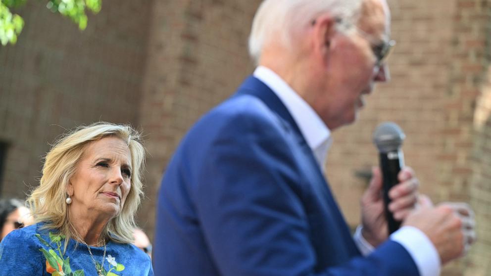 PHOTO: First Lady Jill Biden looks on as President Joe Biden speaks to supporters and volunteers during a campaign stop in Harrisburg, PA, July 7, 2024. 