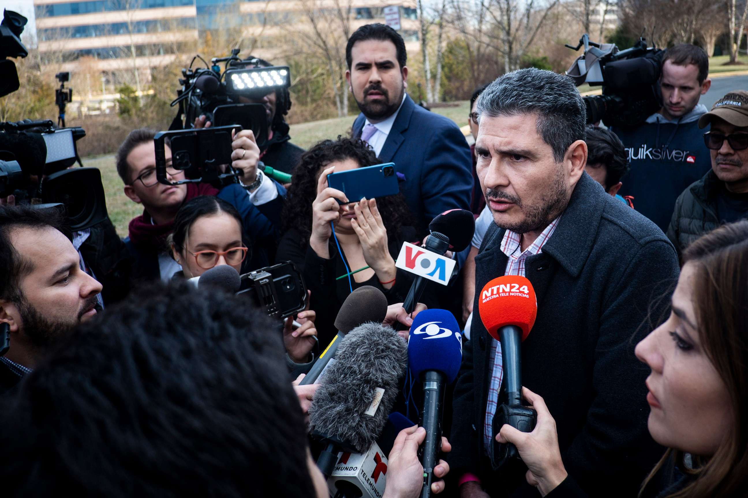 PHOTO: Juan Sebastian Chamorro speaks with reporters after arriving in the United States, in Herndon, Va., Feb. 9, 2023.