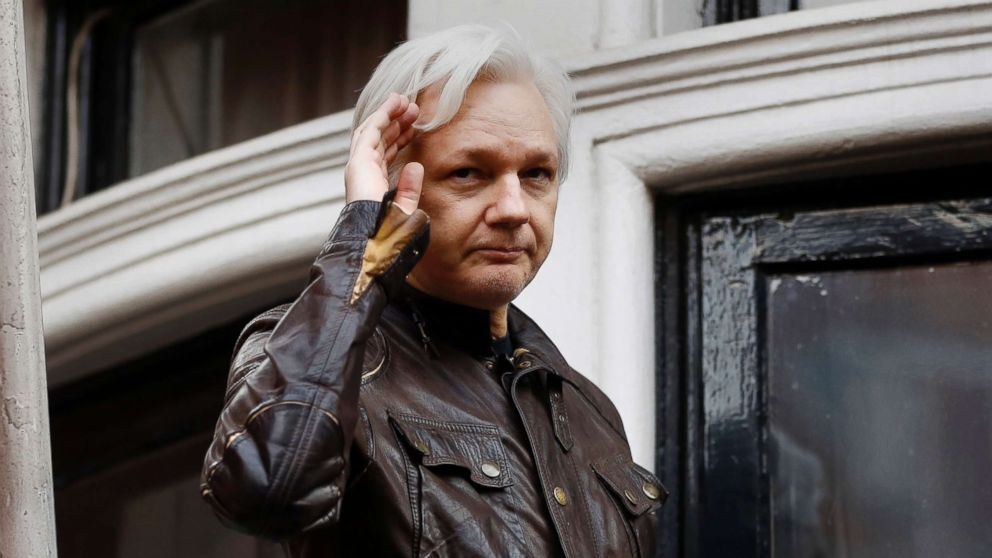 PHOTO: WikiLeaks founder Julian Assange greets supporters from a balcony of the Ecuadorian embassy in London, May 19, 2017.