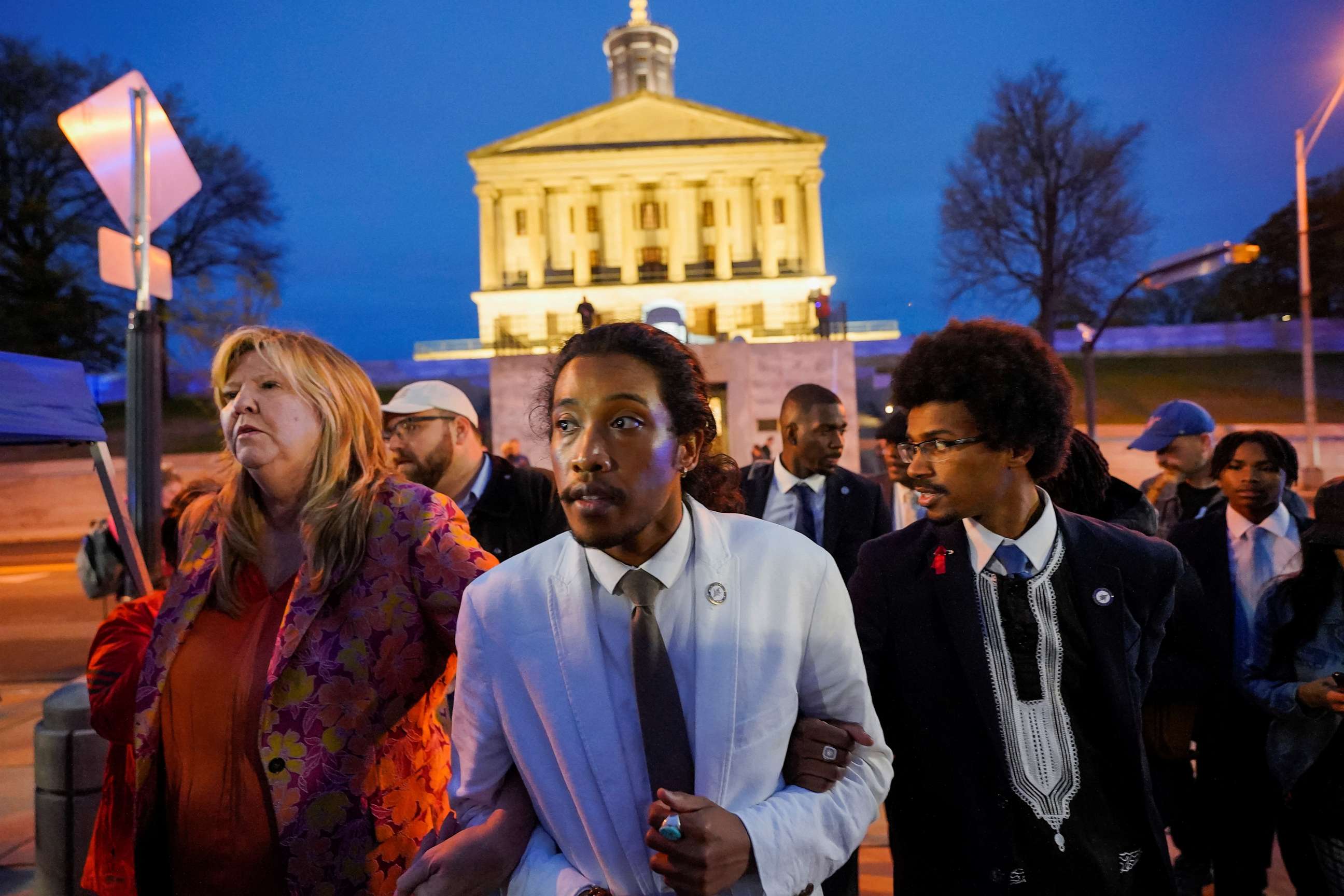 PHOTO: Rep. Justin Pearson, Rep. Justin Jones, and Rep. Gloria Johnson leave the Tennessee State Capitol after a vote at the Tennessee House of Representatives to expel three Democratic members.