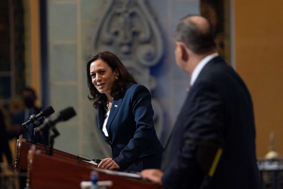 Vice President Kamala Harris, left, looks toward Guatemalan President Alejandro Giammattei, during a news conference on June 7, 2021, at the National Palace in Guatemala City. 