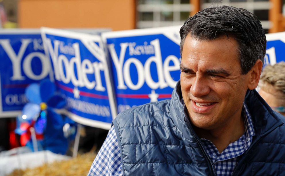 PHOTO: Rep. Kevin Yoder, R-Kan., talks to supporters during a parade in Overland Park, Kan. on Sept. 29, 2018. 