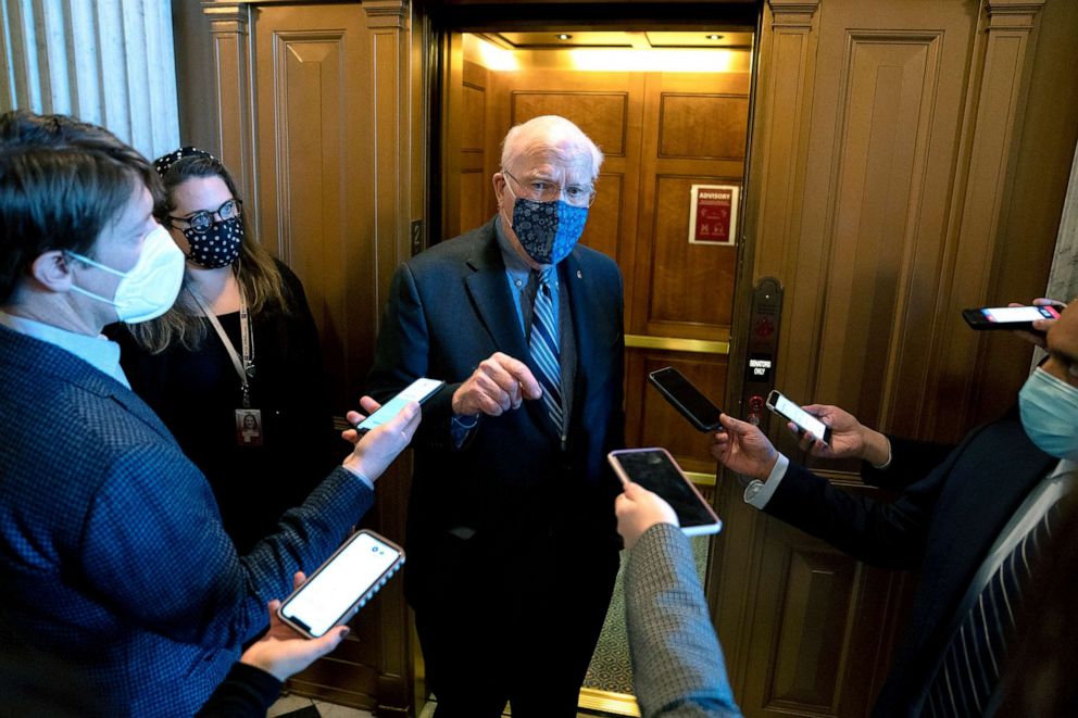 PHOTO: Sen. Patrick Leahy (D-VT) wears a protective mask while speaking to reporters at the Capitol, Jan. 12, 2021.
