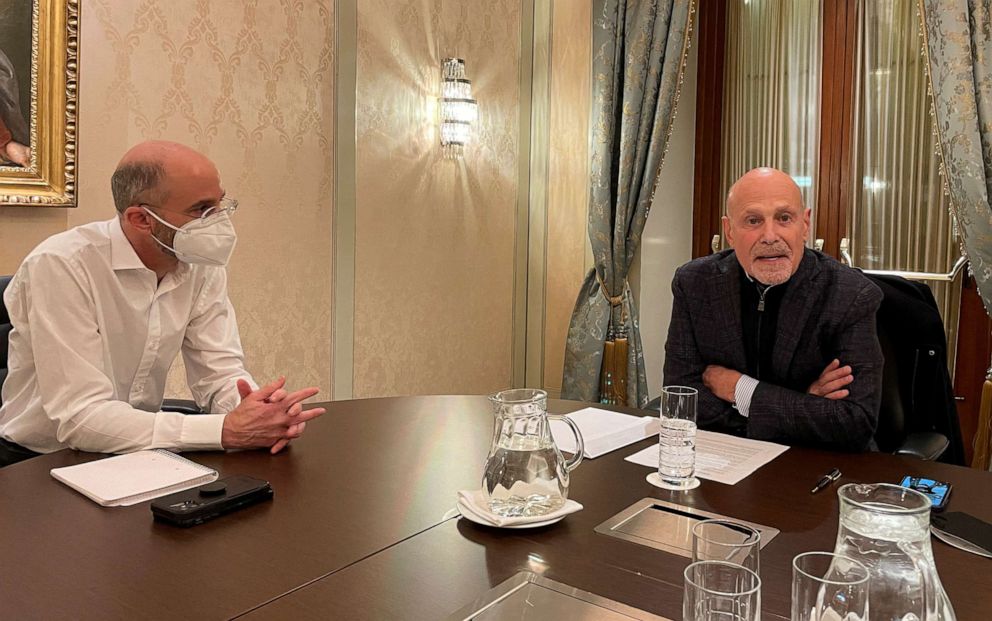 PHOTO: U.S. Special Envoy for Iran Robert Malley and Barry Rosen, campaigning for the release of hostages imprisoned by Iran, sit at a table during an interview with Reuters in Vienna, Austria, Jan. 23, 2022.  