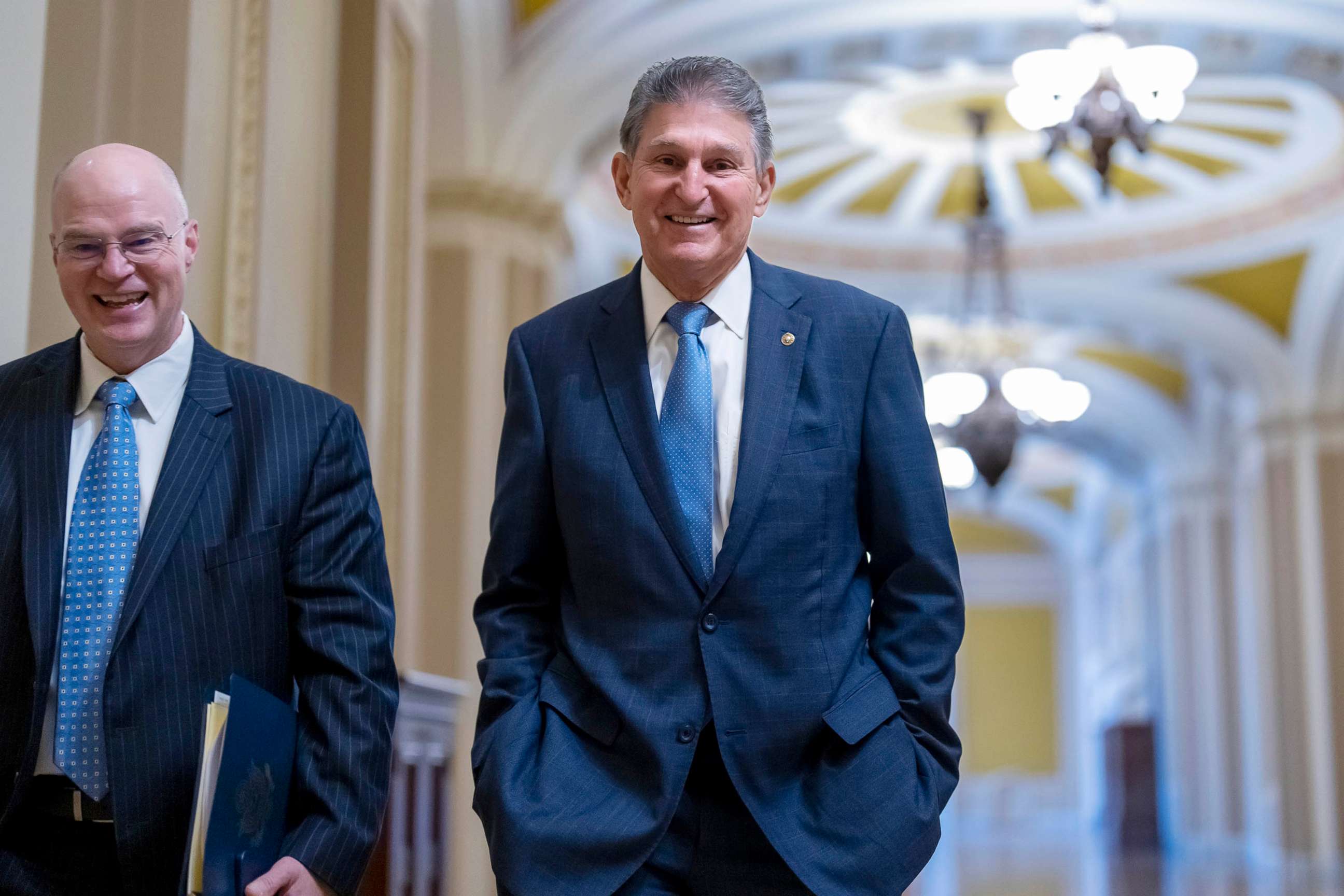 PHOTO: Sen. Joe Manchin smiles as he arrives for the Senate Democratic Caucus leadership election at the Capitol in Washington, Dec. 8, 2022.