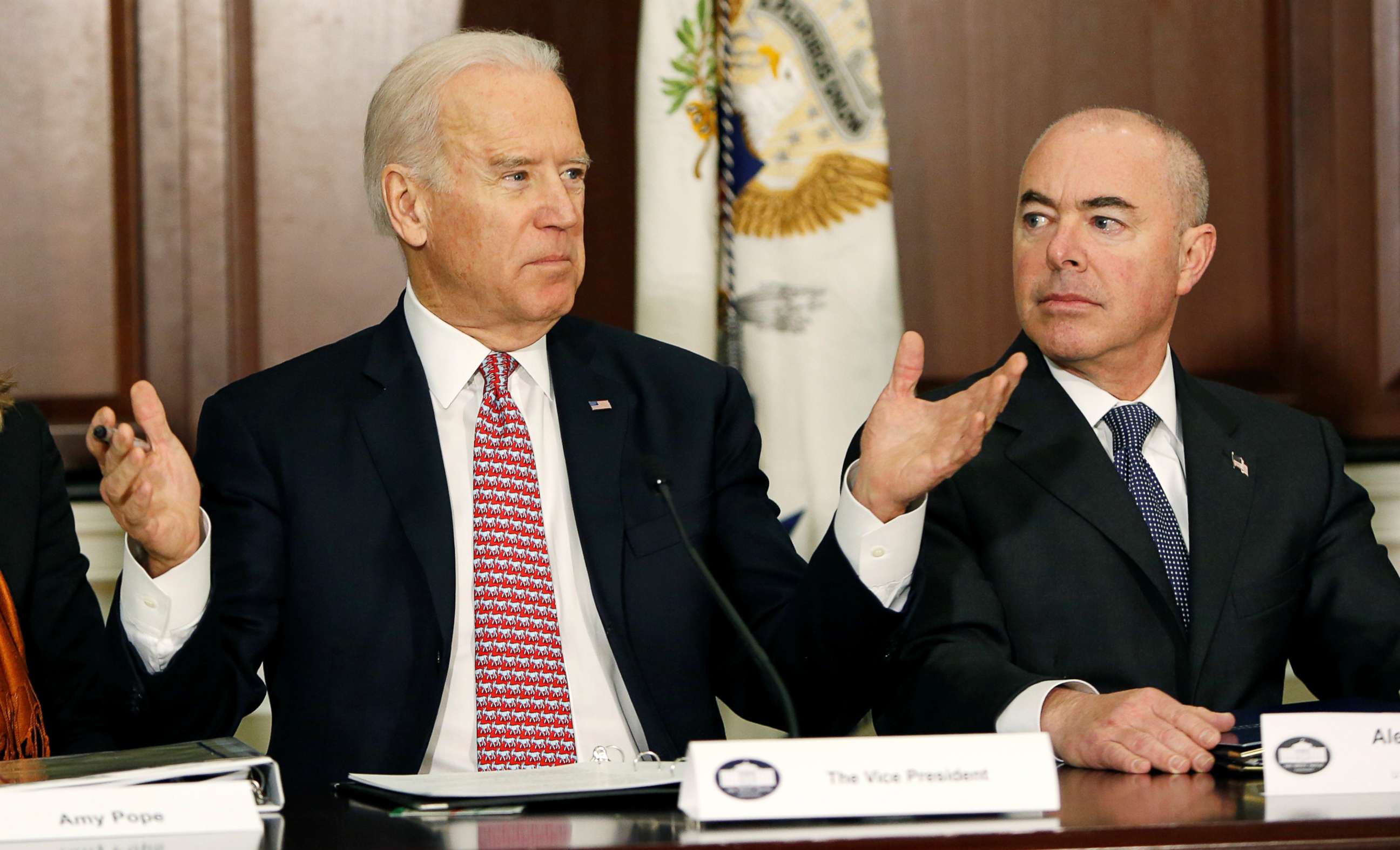 PHOTO: Vice President Joe Biden delivers remarks while attending a roundtable on countering violent extremism at the White House, Feb. 17, 2015, as Deputy Secretary of the Department of Homeland Security Alejandro Mayorkas listens.     