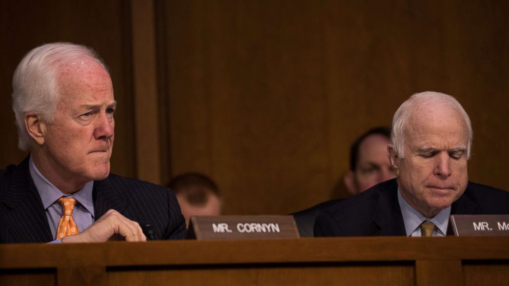 PHOTO: Sen. John Cornyn (R-TX), and Sen. John McCain (R-AZ), listened as former FBI Director James Comey testified in front of the Senate Intelligence Committee, June 8, 2017. 