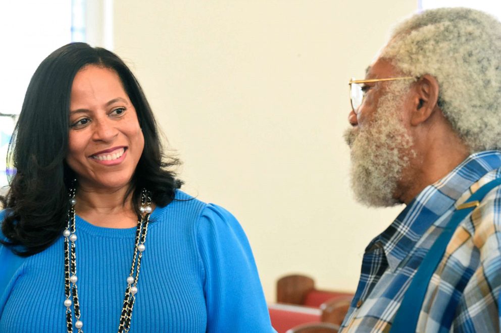 PHOTO: State Sen. Mia McLeod, left, stands in the sanctuary of Shiloh Baptist, her family's church, talking with Rev. Coley Mearite, June 1, 2021, in Bennettsville, S.C.