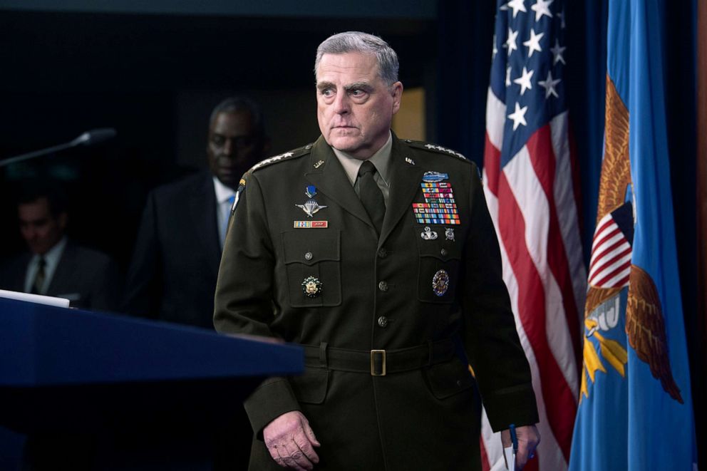 PHOTO: Joint Chiefs Chairman Gen. Mark Milley, right, is followed by Defense Secretary Lloyd Austin as they take the stage for a press briefing at the Pentagon, July 21, 2021, in Washington, D.C.
