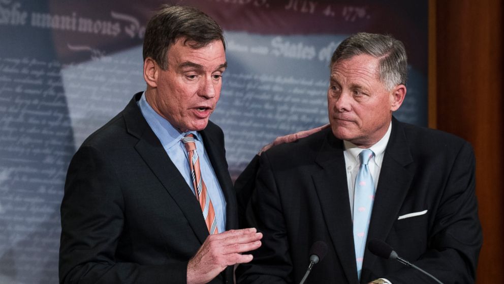 Senate Intelligence Vice Chair Mark Warner, D-Va., left, with Senate Intelligence Chairman Richard Burr, R-N.C.,at a news conference March 29, 2017, to provide an update on the committee's investigation of Russian interference in the 2016 election.