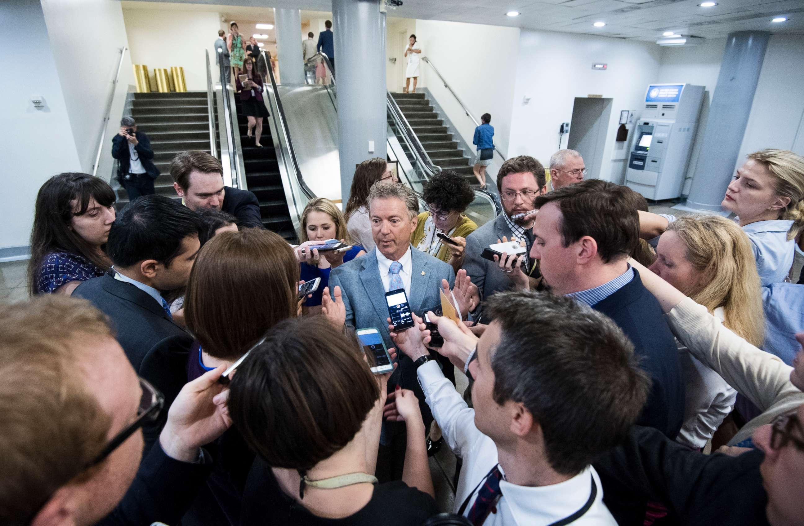 PHOTO: Sen. Rand Paul speaks with reporters as he leaves the Capitol following a vote on, June 26, 2017.