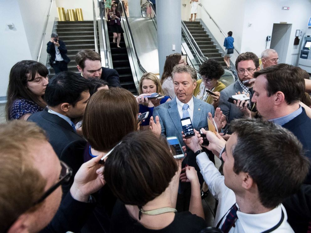 PHOTO: Sen. Rand Paul speaks with reporters as he leaves the Capitol following a vote on, June 26, 2017.