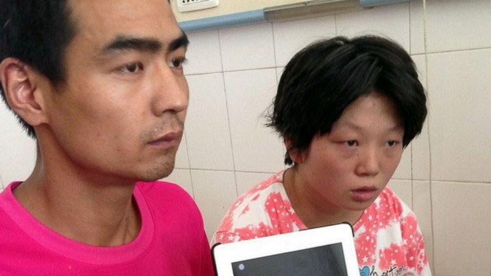 Hospital medic Zhang Lin had told Dong Wan, right, the baby's mother, that her son had been born with severe health problems and was unlikely to survive.