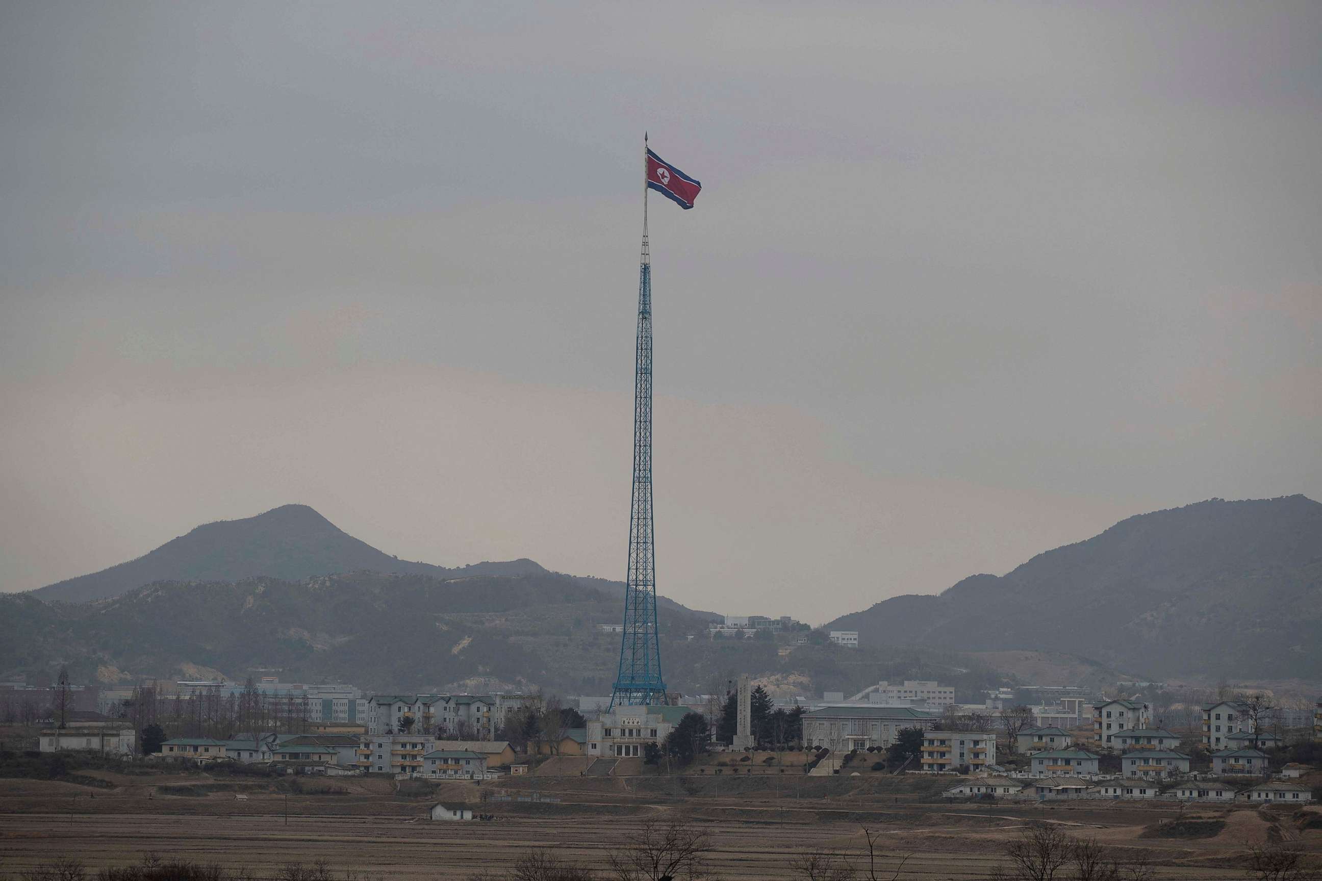 PHOTO: North Korean propaganda village "Gijungdong" is seen from an South Korea's observation post inside the JSA during a media tour at the Joint Security Area (JSA) on the Demilitarized Zone (DMZ) in Paju, South Korea, March 3, 2023.