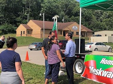 PHOTO: Julian Castro mingles with people who attended the unveiling of his People First Indigenous Communities Policy on July 26, 2019, in Tama, Iowa.