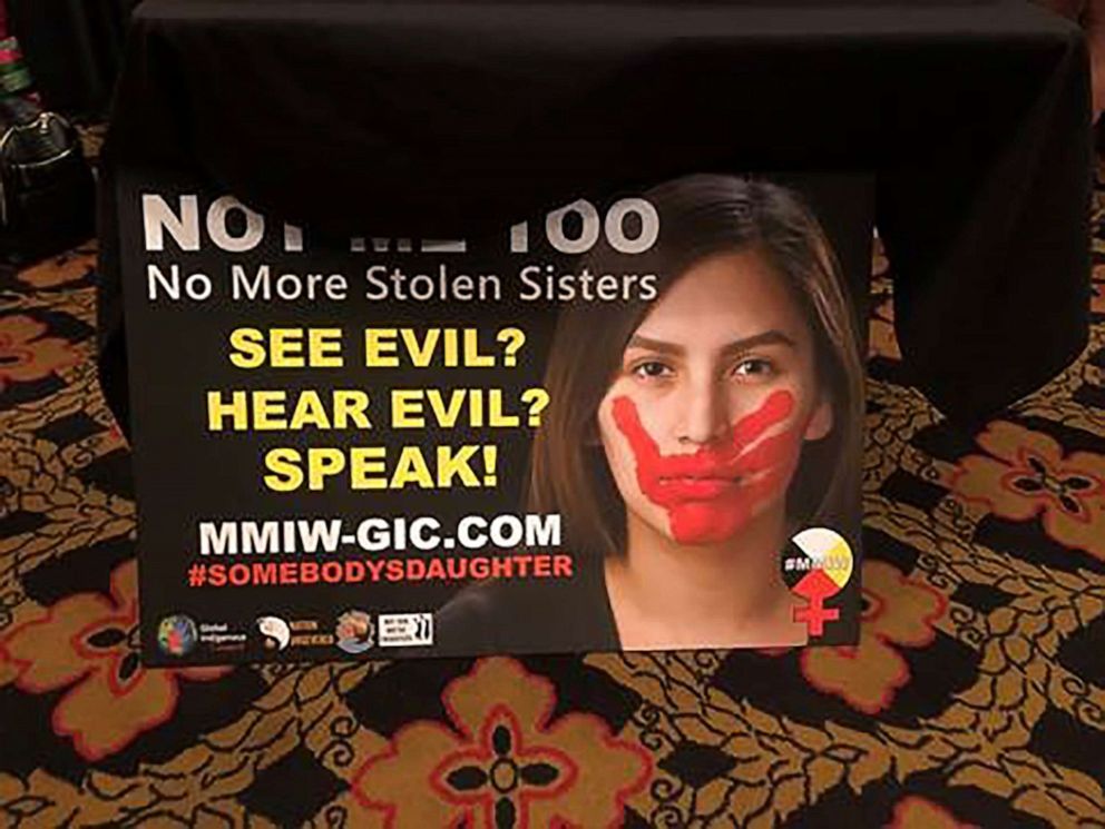 PHOTO: "Not Me Too: No More Stolen Sisters" is written on a sign that activists held up during the Frank Lamere Presidential Forum on August 19, 2019, in Sioux City, Iowa. 