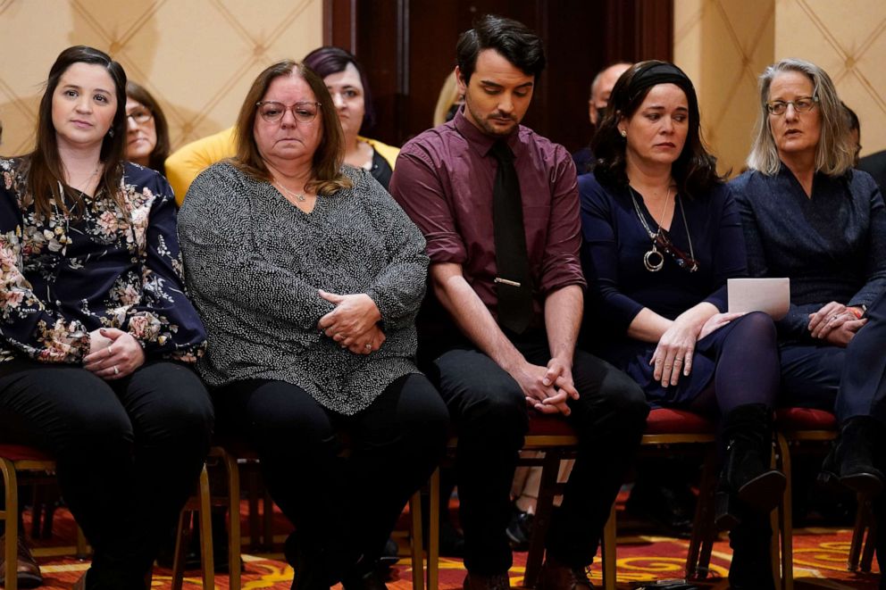 PHOTO: Families of the victims of the Newtown shooting and attorneys listen during a news conference in Trumbull, Conn., Feb. 15, 2022.