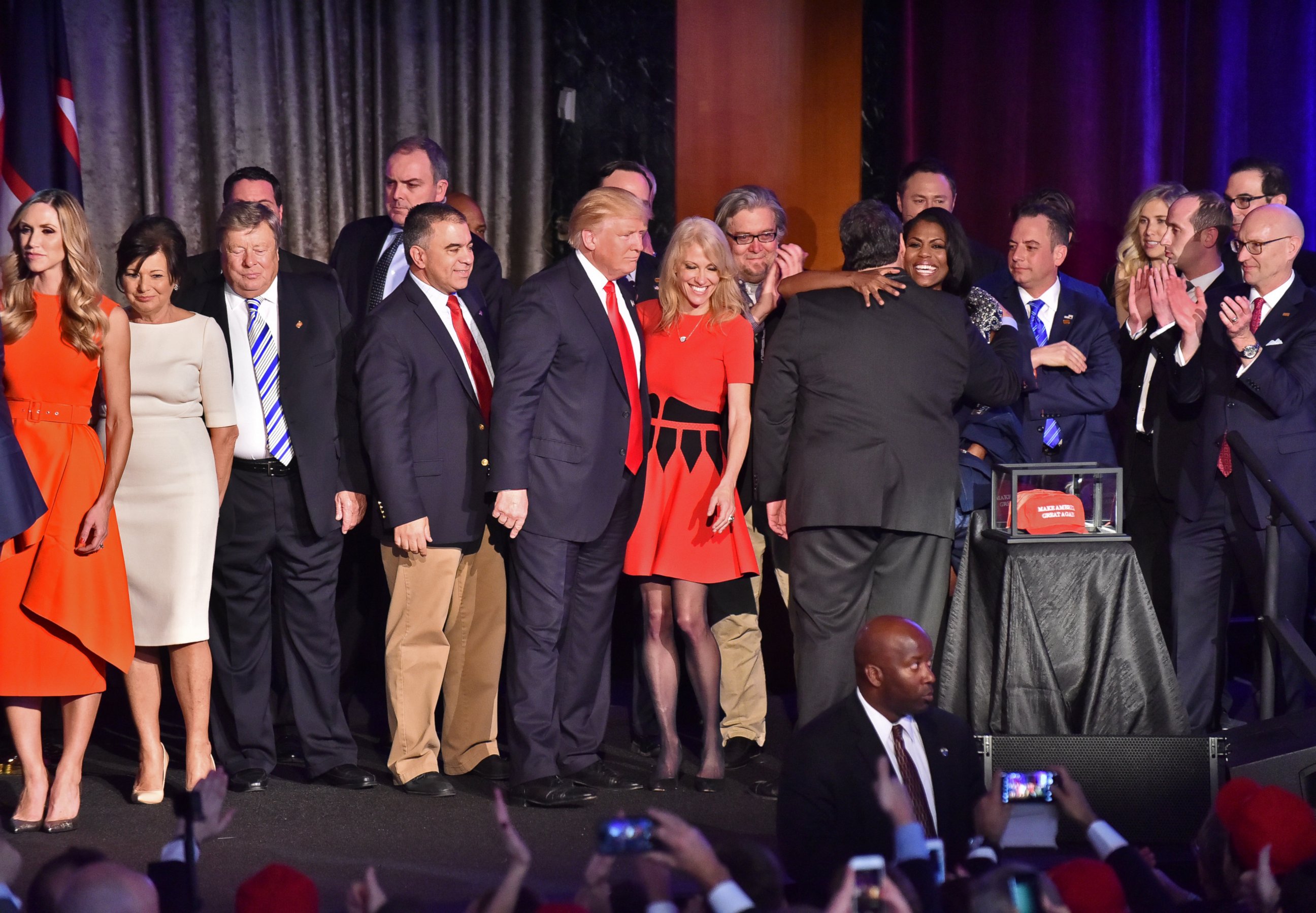 PHOTO: Donald Trump greets campaign manager Kellyanne Conway along with New Jersey Governor Chris Christie (back to camera) and staff member Omarosa Manigault (hugging Christie) after being declared the winner of the presidential election.