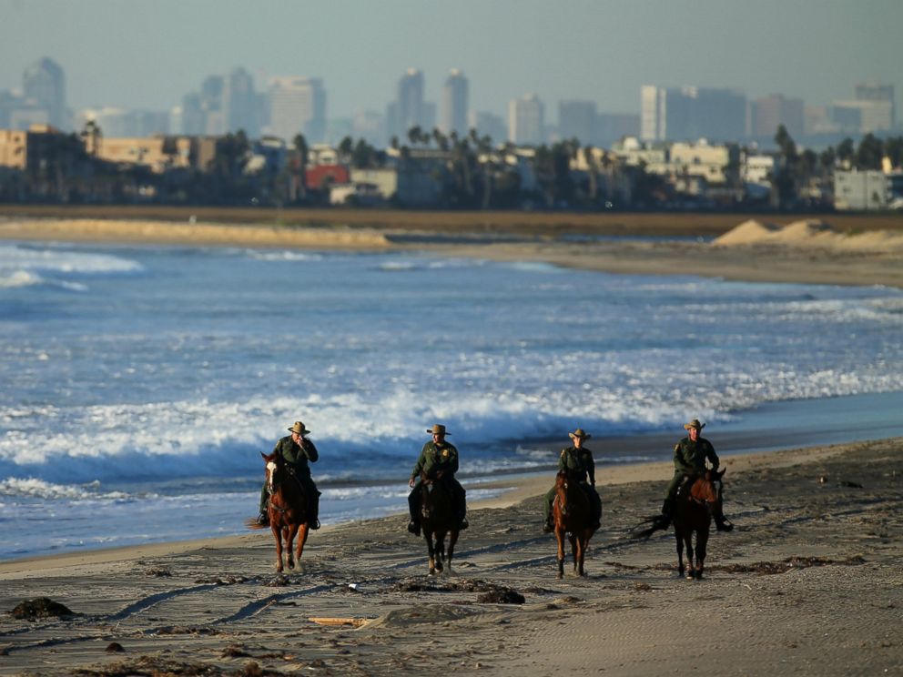 PHOTO: U.S. Border Patrol agents on horseback patrol along a beach just north of the U.S. and Mexico border near San Diego, Calif., Nov. 10, 2016.