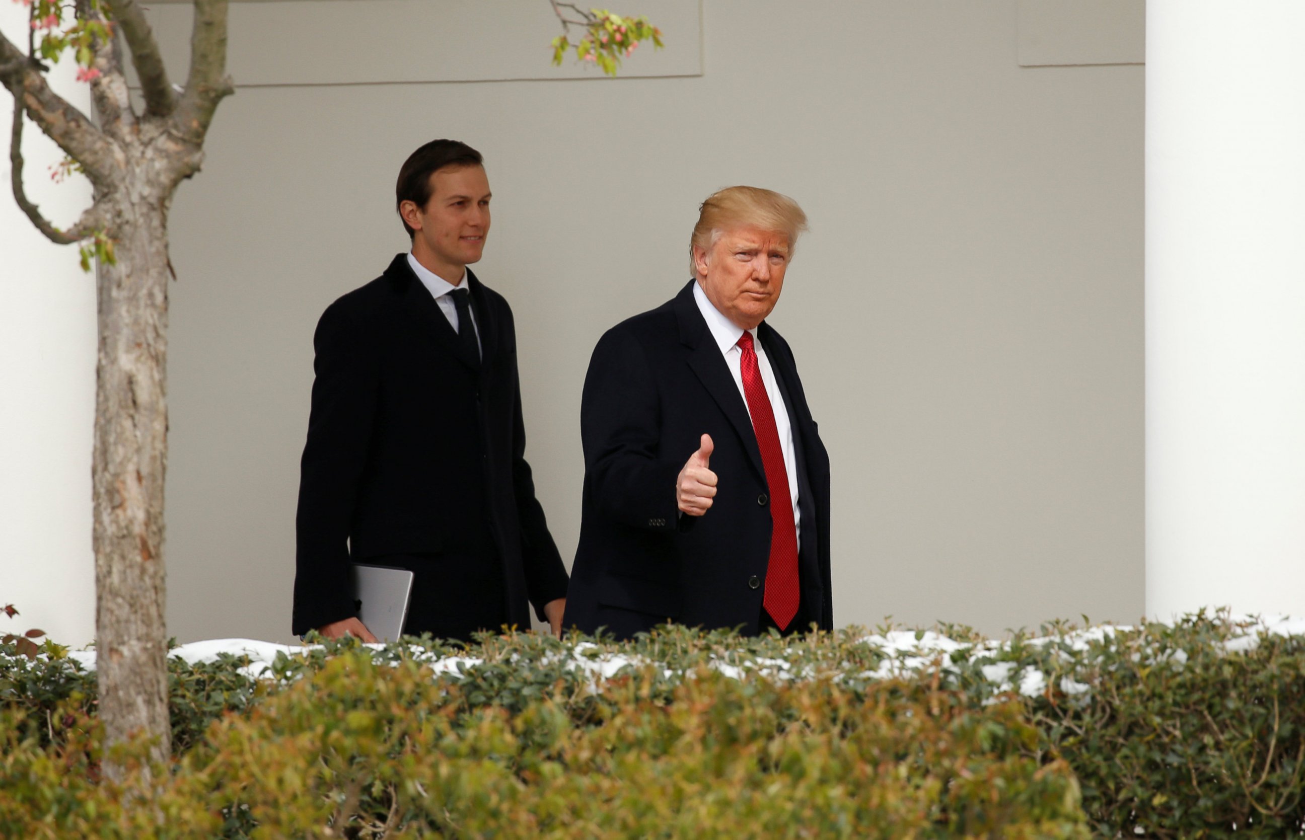PHOTO: U.S. President Donald Trump gives a thumbs-up as he and White House Senior Advisor Jared Kushner depart the White House in Washington, March 15, 2017. 