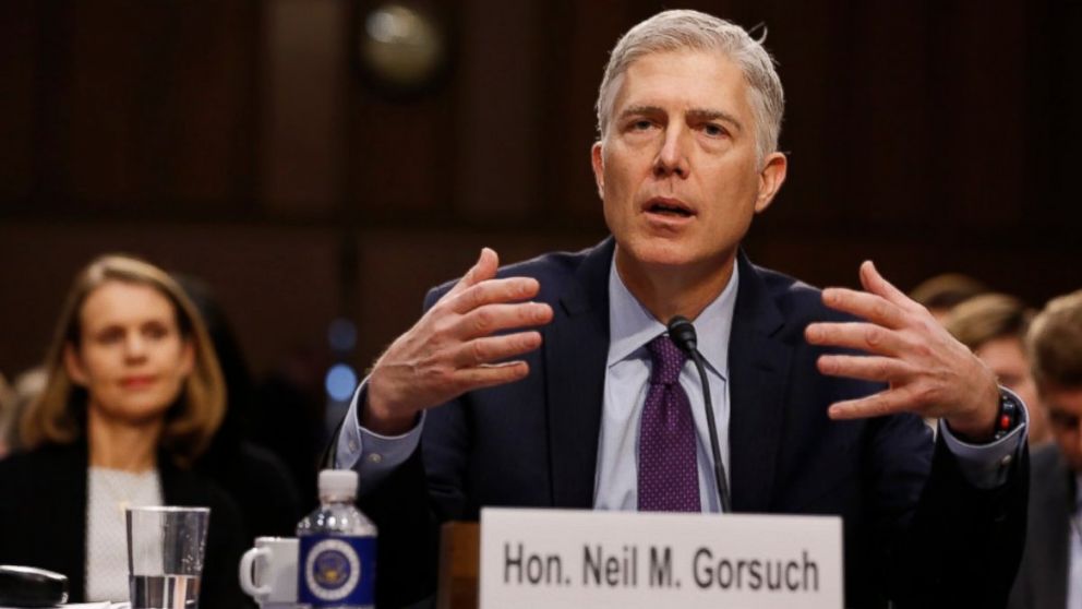 With his wife Louise looking on,U.S. Supreme Court nominee judge Neil Gorsuch testifies during the second day of his Senate Judiciary Committee confirmation hearing on Capitol Hill in Washington, March 21, 2017.
