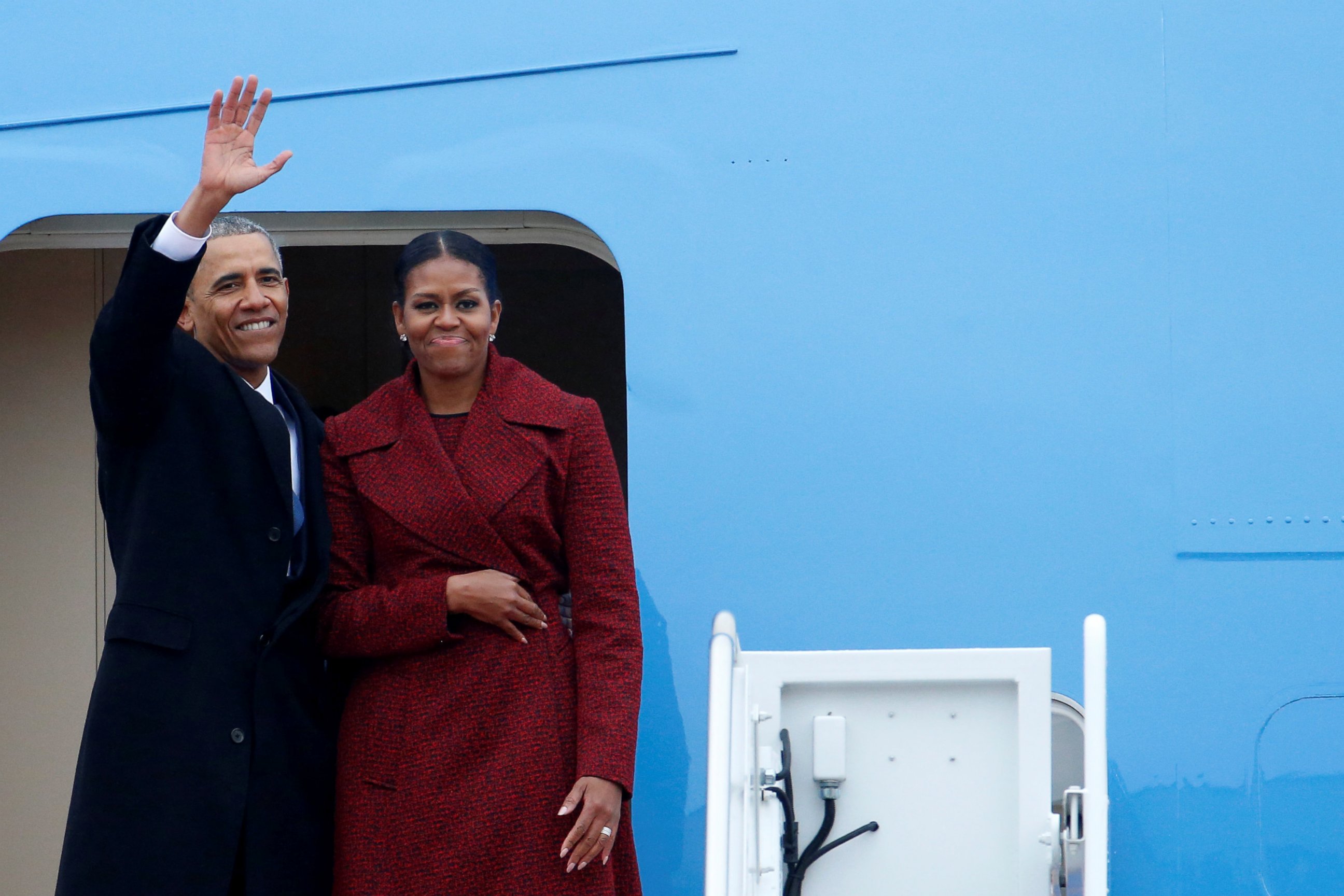 PHOTO: Former president Barack Obama waves with his wife Michelle as they board Special Air Mission 28000, a Boeing 747 which serves as Air Force One, at Joint Base Andrews, Maryland, Jan. 20, 2017.  