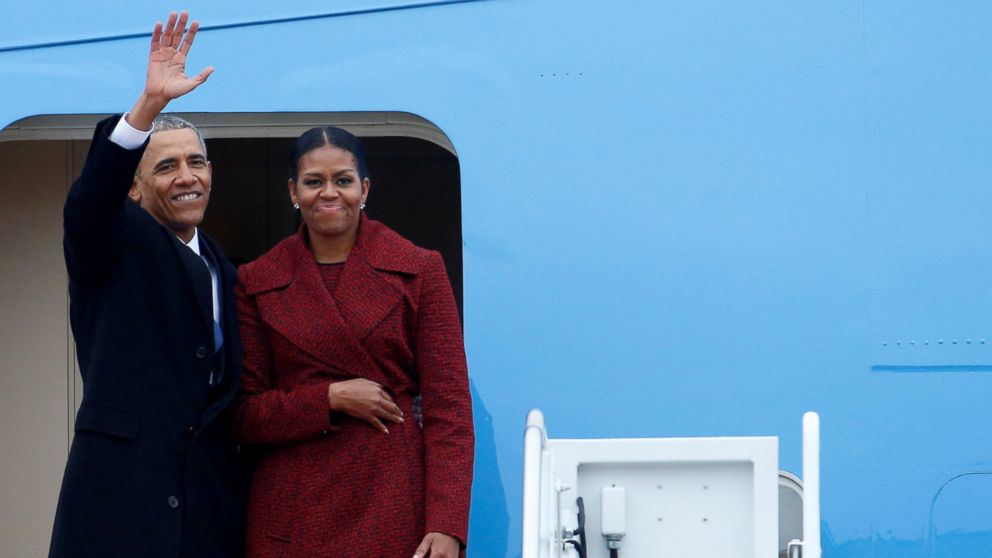PHOTO: Former president Barack Obama waves with his wife Michelle as they board Special Air Mission 28000, a Boeing 747 which serves as Air Force One, at Joint Base Andrews, Maryland, Jan. 20, 2017.  